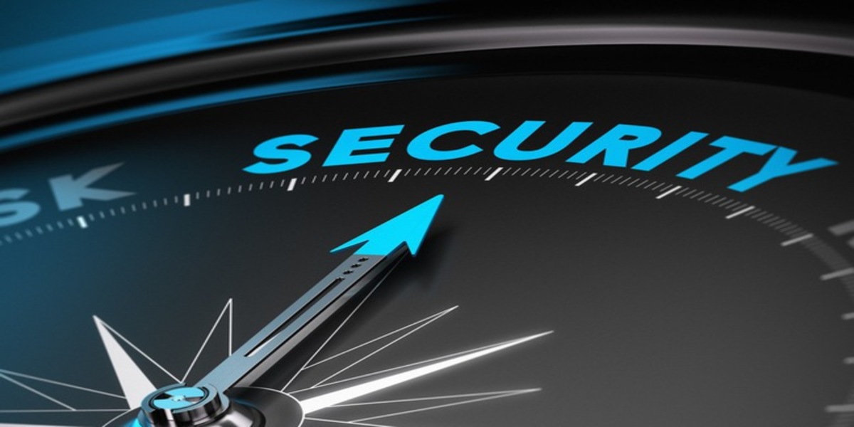 Compass needle pointing the word security. Concept image blue and black tones